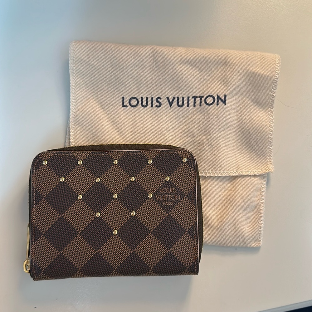 Authentic Louis Vuitton zippy coin purse/ card holder with studs